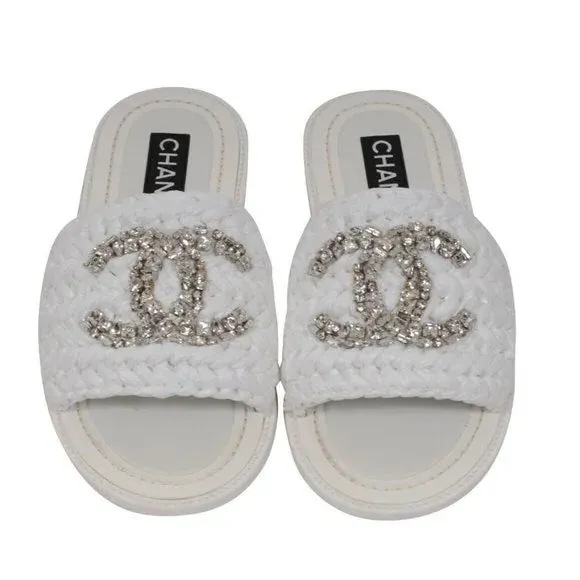CHANEL CC CRYSTAL LOGO RAFFIA STRASS SANDALS MULES